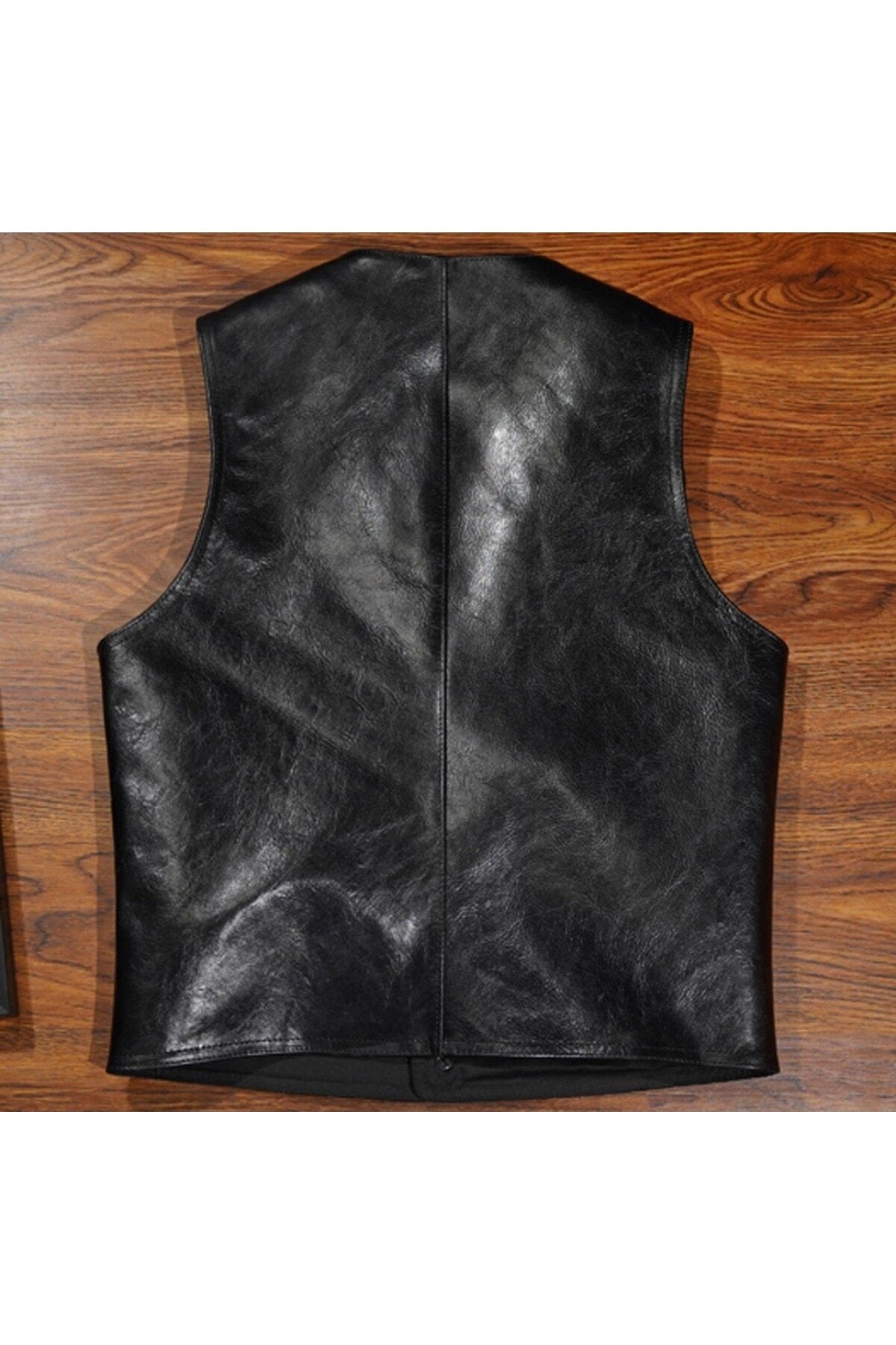 Kalın Dana derisi zik yelek dış yanlarda cep yok; içerde sağlı sollu cepler mevcuttur,